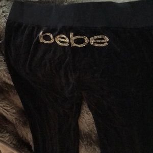 Black BEBE sweat pants , black and gold . NEW